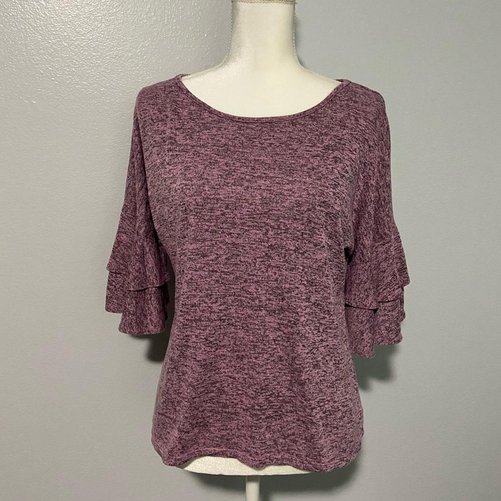 Wilde pink & black top, layered arm detail, back slightly longer. Medium